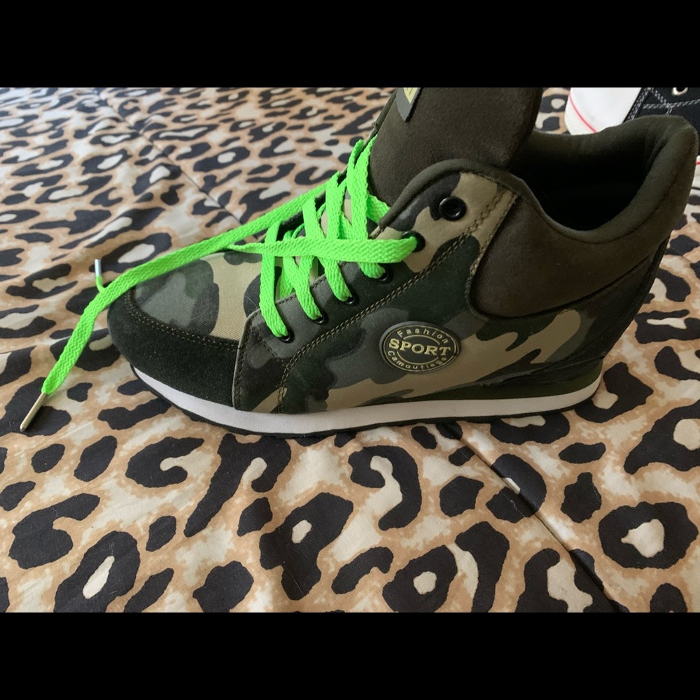 Camouflage wedge sneaker.